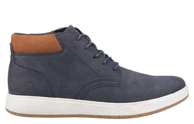 Step into timeless style and all-day comfort with the Hush Puppies Bronko Men's Chukka Boots. Crafted with a genuine nubuck leather upper and a soft padded collar, these boots offer a premium feel and enhanced comfort. The lace-up design ensures a secure, adjustable fit, while the light, breathable textile lining keeps your feet cool and fresh. Finished with a durable rubber outsole, the Bronko Chukka is built to lastperfect for everyday wear with a refined, classic look.
- Nubuck leather upper
-Soft padded collar
-Lace-up design for a secure, adjustable fit
-Light, breathable lining keeps feet cool and fresh
-Durable rubber outsole for long-lasting wear
- Hush Puppies branding