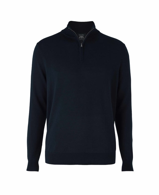 Wrap yourself in unparalleled comfort with this navy quarter zip jumper, crafted from 12-gauge extra-fine non-mulesed Merino wool in navy. The exquisitely soft knit is not only wonderfully warm but also incredibly breathable, making it the ideal layering piece for all seasons. The refined ¼ zip neck adds versatility, allowing you to wear it zipped up for a sharp, sleek finish or open for a more relaxed, effortless look. Luxurious in both feel and appearance, this men's jumper is designed for those who appreciate the finer things in life. 100% Merino wool. 12 gauge extra fine non mulesed merino. Fully fashioned sleeve. Quarter neck zip neck opening. Regular fit. Can be hand washed at 30°C inside out. Reshape whilst wet and dry flat. Do not bleach or tumble dry. Can be dry cleaned. Packaged in a fully recycled bag.