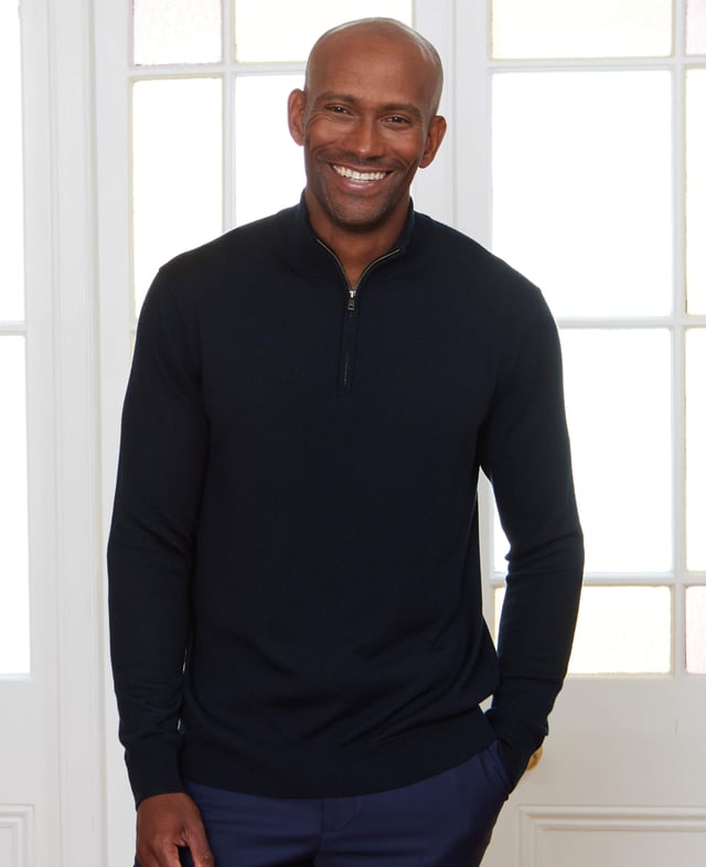 Wrap yourself in unparalleled comfort with this navy quarter zip jumper, crafted from 12-gauge extra-fine non-mulesed Merino wool in navy. The exquisitely soft knit is not only wonderfully warm but also incredibly breathable, making it the ideal layering piece for all seasons. The refined ¼ zip neck adds versatility, allowing you to wear it zipped up for a sharp, sleek finish or open for a more relaxed, effortless look. Luxurious in both feel and appearance, this men's jumper is designed for those who appreciate the finer things in life. 100% Merino wool. 12 gauge extra fine non mulesed merino. Fully fashioned sleeve. Quarter neck zip neck opening. Regular fit. Can be hand washed at 30°C inside out. Reshape whilst wet and dry flat. Do not bleach or tumble dry. Can be dry cleaned. Packaged in a fully recycled bag.