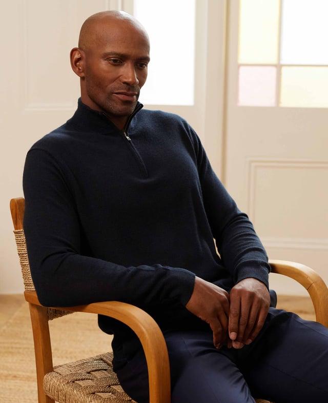 Wrap yourself in unparalleled comfort with this navy quarter zip jumper, crafted from 12-gauge extra-fine non-mulesed Merino wool in navy. The exquisitely soft knit is not only wonderfully warm but also incredibly breathable, making it the ideal layering piece for all seasons. The refined ¼ zip neck adds versatility, allowing you to wear it zipped up for a sharp, sleek finish or open for a more relaxed, effortless look. Luxurious in both feel and appearance, this men's jumper is designed for those who appreciate the finer things in life. 100% Merino wool. 12 gauge extra fine non mulesed merino. Fully fashioned sleeve. Quarter neck zip neck opening. Regular fit. Can be hand washed at 30°C inside out. Reshape whilst wet and dry flat. Do not bleach or tumble dry. Can be dry cleaned. Packaged in a fully recycled bag.