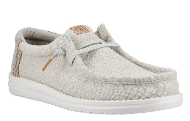 These Hey Dude Wally Jute Shoes bring a natural touch to your warm-weather wardrobe. Made from 100% jute, these shoes are lightweight, breathable, and perfect for spring and summer adventures. Designed with a textile upper, cork heel, and woven gradient heel webbing, they combine effortless style with unbeatable comfort. The elastic laces and easy-on system make them travel-friendly, while the removable foam insole ensures all-day cushioning. A flexible outsole adds the finishing touch for comfort on the go.
  Textile upper 
  Cork heel 
  Elastic laces for easy on/off wear 
  Travel-ready design with removable foam insole
  Lightweight flexible outsole for all-day comfort
  Hey Dude branding