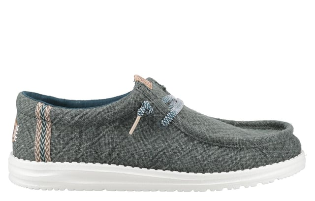 These Hey Dude Wally Jute Shoes bring a natural touch to your warm-weather wardrobe. Made from 100% jute, these shoes are lightweight, breathable, and perfect for spring and summer adventures. Designed with a textile upper, cork heel, and woven gradient heel webbing, they combine effortless style with unbeatable comfort. The elastic laces and easy-on system make them travel-friendly, while the removable foam insole ensures all-day cushioning. A flexible outsole adds the finishing touch for comfort on the go.
  Textile upper 
  Cork heel 
  Elastic laces for easy on/off wear 
  Travel-ready design with removable foam insole
  Lightweight flexible outsole for all-day comfort
  Hey Dude branding