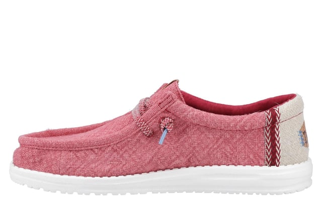 These Hey Dude Wally Jute Shoes bring a natural touch to your warm-weather wardrobe. Made from 100% jute, these shoes are lightweight, breathable, and perfect for spring and summer adventures. Designed with a textile upper, cork heel, and woven gradient heel webbing, they combine effortless style with unbeatable comfort. The elastic laces and easy-on system make them travel-friendly, while the removable foam insole ensures all-day cushioning. A flexible outsole adds the finishing touch for comfort on the go.
  Textile upper 
  Cork heel 
  Elastic laces for easy on/off wear 
  Travel-ready design with removable foam insole
  Lightweight flexible outsole for all-day comfort
  Hey Dude branding