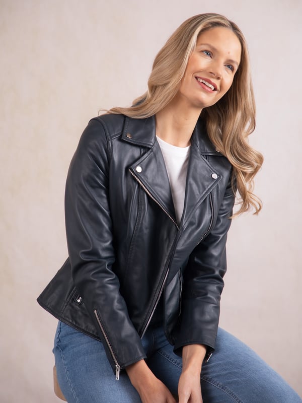 Tarraby Leather Biker Jacket in Navy A timeless outerwear essential, the Tarraby reimagines the classic biker jacket with refined detailing for any occasion. Crafted from supple semi aniline leather, the Tarraby is effortlessly versatile, able to be dressed up or down as needed. Featuring an asymmetric zip fastening and iconic biker lapels and collar, it’s tailored to enhance your natural curves, creating a flattering, stylish silhouette.