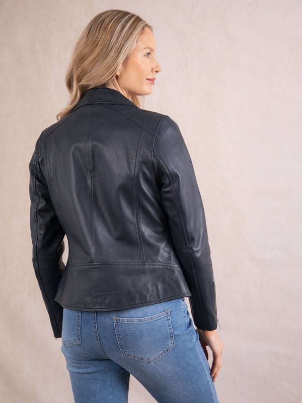 Tarraby Leather Biker Jacket in Navy A timeless outerwear essential, the Tarraby reimagines the classic biker jacket with refined detailing for any occasion. Crafted from supple semi aniline leather, the Tarraby is effortlessly versatile, able to be dressed up or down as needed. Featuring an asymmetric zip fastening and iconic biker lapels and collar, it’s tailored to enhance your natural curves, creating a flattering, stylish silhouette.
