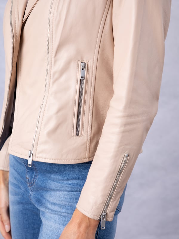 Tarraby Leather Biker Jacket in Parchment A timeless outerwear essential, the Tarraby reimagines the classic biker jacket with refined detailing for any occasion. Crafted from supple semi aniline leather, the Tarraby is effortlessly versatile, able to be dressed up or down as needed. Featuring an asymmetric zip fastening and iconic biker lapels and collar, it’s tailored to enhance your natural curves, creating a flattering, stylish silhouette.