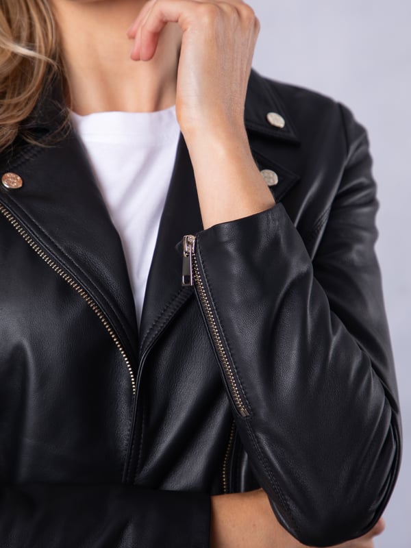 Knotts Leather Biker Jacket in Black The Knotts biker is a fresh update to the much-loved Kylee style, now introduced in two versatile shades.
Crafted from the finest semi aniline leather, this jacket embodies Lakeland Leather's commitment to quality and timeless design. It retains the iconic biker jacket elements, including an asymmetrical zip fastening, classic lapels, as well as sleek tonal hardware.
With its slightly longer length, the Knotts jacket is as versatile as it is flattering. Effortlessly pair it with jeans for a relaxed edge or drape it over a flowing dress for a chic contrast. Designed to suit all ages and seasons, this is a wardrobe essential with enduring appeal.