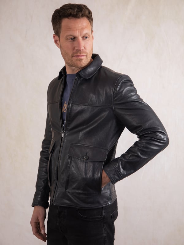 Add the suave Hesket leather jacket to effortlessly elevate your wardrobe. Crafted from the highest quality vegetable tanned aniline leather that&rsquo;ll get better and more unique with each wear, this deep navy jacket has been inspired by the 70s for ultimate vintage appeal. A classic collar, easy centre zip and large pockets (as well as three inner ones) make the Hesket the perfect combination of style and substance.