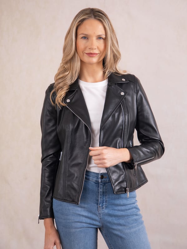 Tarraby Leather Biker Jacket in Black A timeless outerwear essential, the Tarraby reimagines the classic biker jacket with refined detailing for any occasion. Crafted from supple semi aniline leather, the Tarraby is effortlessly versatile, able to be dressed up or down as needed. Featuring an asymmetric zip fastening and iconic biker lapels and collar, it’s tailored to enhance your natural curves, creating a flattering, stylish silhouette.
