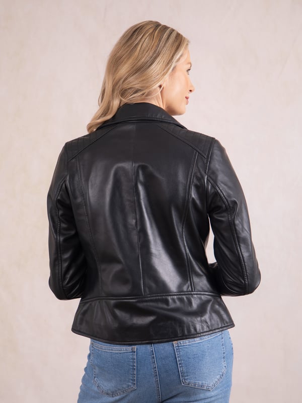 Tarraby Leather Biker Jacket in Black A timeless outerwear essential, the Tarraby reimagines the classic biker jacket with refined detailing for any occasion. Crafted from supple semi aniline leather, the Tarraby is effortlessly versatile, able to be dressed up or down as needed. Featuring an asymmetric zip fastening and iconic biker lapels and collar, it’s tailored to enhance your natural curves, creating a flattering, stylish silhouette.