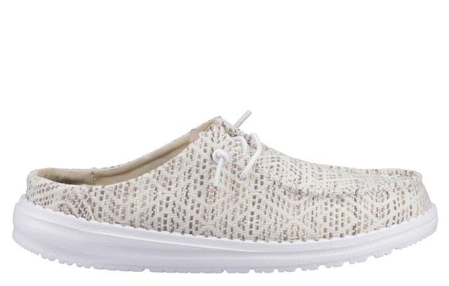 The Hey Dude Wendy Surf Baja Women's Mules are the perfect blend of laid-back style and ultimate comfort. Featuring a woven textile upper with a trendy surf baja-inspired design and a unique embroidered texture, these slip-ons exude casual coolness. The easy-on system, elastic laces, and lightweight flexible outsole make them travel-ready, while the removable foam insole offers plush cushioning for all-day comfort. Whether you're lounging or on the go, these mules will have you living your best relaxed life.
-Woven textile upper with surf baja-inspired design
- Unique embroidered texture for added style
- Slip-on design with elastic laces for easy wear
- Lightweight, flexible outsole ideal for travel
- Removable foam insole for plush all-day comfort
- Perfect for lounging or casual outings
- Hey Dude branding