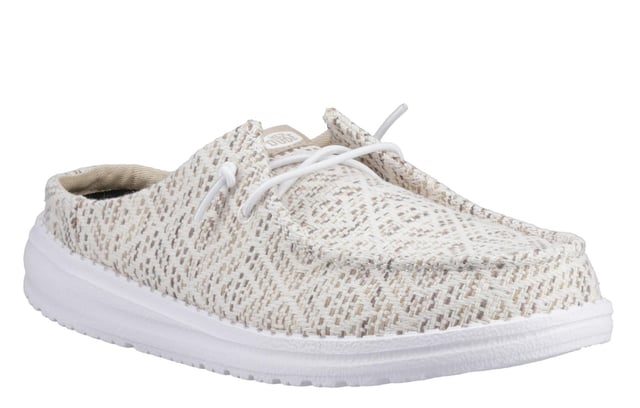 The Hey Dude Wendy Surf Baja Women's Mules are the perfect blend of laid-back style and ultimate comfort. Featuring a woven textile upper with a trendy surf baja-inspired design and a unique embroidered texture, these slip-ons exude casual coolness. The easy-on system, elastic laces, and lightweight flexible outsole make them travel-ready, while the removable foam insole offers plush cushioning for all-day comfort. Whether you're lounging or on the go, these mules will have you living your best relaxed life.
-Woven textile upper with surf baja-inspired design
- Unique embroidered texture for added style
- Slip-on design with elastic laces for easy wear
- Lightweight, flexible outsole ideal for travel
- Removable foam insole for plush all-day comfort
- Perfect for lounging or casual outings
- Hey Dude branding