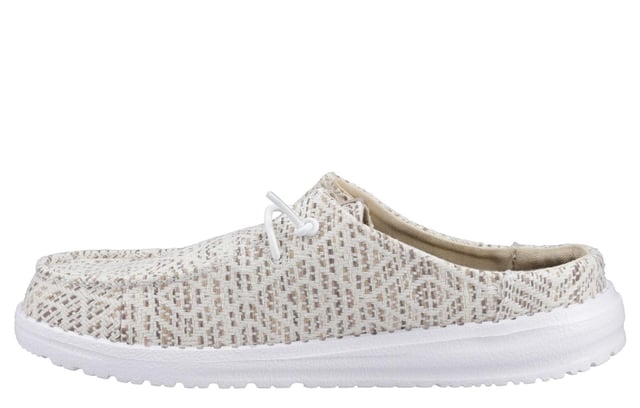 The Hey Dude Wendy Surf Baja Women's Mules are the perfect blend of laid-back style and ultimate comfort. Featuring a woven textile upper with a trendy surf baja-inspired design and a unique embroidered texture, these slip-ons exude casual coolness. The easy-on system, elastic laces, and lightweight flexible outsole make them travel-ready, while the removable foam insole offers plush cushioning for all-day comfort. Whether you're lounging or on the go, these mules will have you living your best relaxed life.
-Woven textile upper with surf baja-inspired design
- Unique embroidered texture for added style
- Slip-on design with elastic laces for easy wear
- Lightweight, flexible outsole ideal for travel
- Removable foam insole for plush all-day comfort
- Perfect for lounging or casual outings
- Hey Dude branding