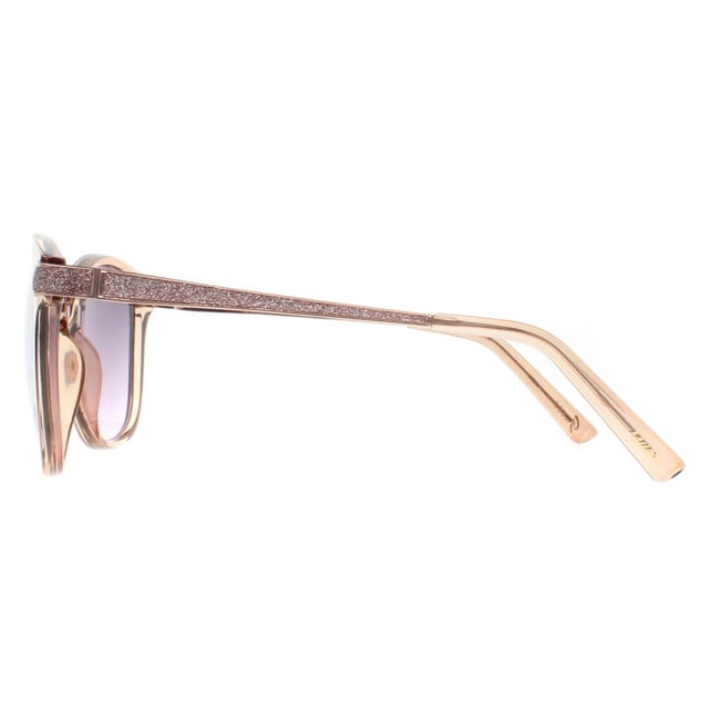 Guess Square Womens Shiny Beige  Bordeaux Gradient GF6104  Sunglasses Turn up the glam with the Guess GF6104 sunglassesï¿½where sleek design meets everyday edge. With their bold, oversized shape and modern detailing, these shades channel runway confidence with street-ready appeal. Featuring high-quality lenses for full UV protection and lightweight frames for all-day wear, the GF6104 blends fashion and function effortlessly. Signature Guess accents complete the look, making these sunnies your go-to accessory for bold style under the sun.