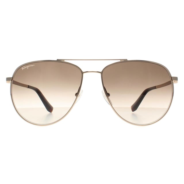 Salvatore Ferragamo Aviator Unisex Gold Gray Gradient SF157S  Sunglasses feature a bold frame that adds sophistication to any outfit. Designed for those who seek both fashion and function, these sunglasses protect your eyes while making a statement.