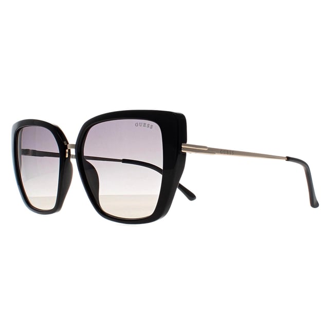 Guess Cat Eye Womens Shiny Black   Grey Gradient GF6199  Sunglasses feature a sleek, modern design with a lightweight frame, offering both style and comfort. The polycarbonate lenses provide 100% UV400 protection, ensuring your eyes stay safe under the sun. With a variety of frame and lens color combinations, these sunglasses add a fashionable touch to any outfit while providing optimal sun protection.