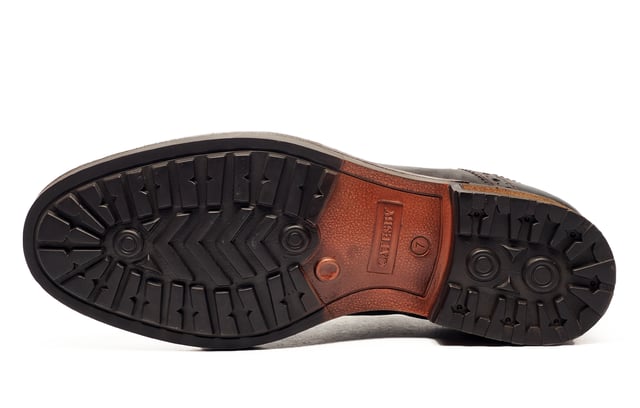 Catesby England was founded in 1970 with a vision and dedication focused on quality, craftsmanship, and a fine attention to detail. From its modest beginnings in a countryside workshop, Catesby England grew into a name synonymous with classic English footwear, blending heritage with modern craftsmanship, manufactured from the finest leathers to ensure durability, comfort, and effortless style.
 Where timeless elegance meets rugged practicality. The SE Catesby Appleby Brogues blend traditional brogue craftsmanship with a modern, outdoor-ready design. Crafted from premium leather, these shoes feature classic wingtip and brogue detailing for a refined aesthetic, while the robust rubber sole delivers superior grip and durability across varied terrains.
 Whether you're navigating city streets or country lanes, the Appleby ensures all-day comfort with its lace-up closure for a secure, adjustable fit. The addition of a wooded heel lends a touch of sophistication and stability, making these brogues a versatile choice for both smart-casual and formal wear.
 - Premium Waxy Leather upper
 - Brogue Detailing
 - Lace-Up Closure
 - Soft textile lining
 - Durable rubber sole
 - Catesby branding
 
 Please Note: These brogues have a dull vintage waxed finish. This is part of the new quality make up of the shoe and is not a fault. There may also be a stickly effect around the welt of the shoe which will wipe clean with a finger or smooth damp cloth. This is nothing more than residue which has been caused by humidity or storage during transportation.
