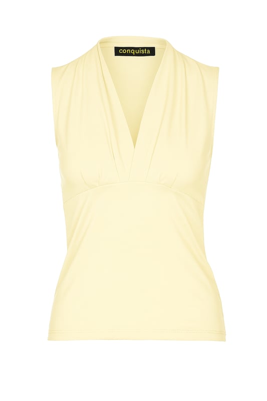 Ilumina tu guardarropa con este elegante top color crema sin mangas con cuello en V, confeccionado con una mezcla de punto de algodón y elastano suave y transpirable. Diseñado para un ajuste elástico cómodo, este top ofrece un equilibrio perfecto entre estructura y flexibilidad. El elegante escote en V y el suave detalle fruncido crean una silueta favorecedora, lo que lo convierte en un básico versátil para cualquier ocasión. Ya sea vestido con pantalones entallados o con un estilo informal con mezclilla, este top es una adición sencilla a tus elementos esenciales del día a día. Perfecto para días cálidos o para usar debajo de blazers y cárdigans.