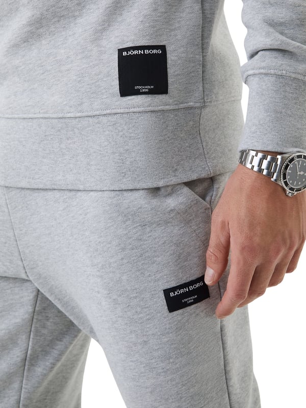 Heren sweater van het merk Bjorn Borg in de kleur grijs. De sweater is gemaakt van hoogwaardig katoen en polyester.