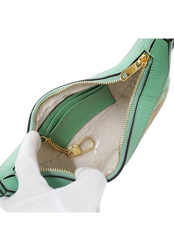 Brand: Gucci
Model: Ophidia
Color: Green
Material: Canvas
Inclusions: Box Dust bag
Dimensions: W 20 cm x H 9 cm x D 5 cm
Serial number: None
Country of origin: Italy
Condition: AB - good condition.
Outside condition : Slight scratches
Inside condition : Good
Handle condition : Good
Corner condition : Slight rubbing
Metal fittings condition : Slight scratchesBrand: GucciType: shoulderMain Material: Canvas