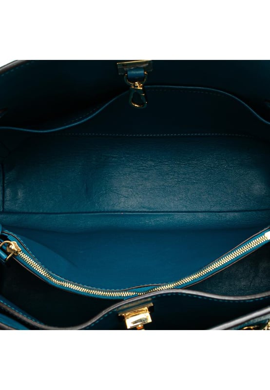 The Milla MM features a leather body rolled leather handles an open top with a lobster hook and twist lock closure an interior zip compartment and interior slip pockets.Brand: Louis VuittonCondition: Pre-lovedType: SatchelRating: B+Main Material: LeatherDimensions (LxWxD): 25x38x15Handle Drop: 13Dust Bag: YesComments: Lock Scratched. Exterior Corners Worn. Exterior Front Scratched. Exterior Handle Cracked Creased Worn. Interior Pocket Scratched. Interior Pocket stained with Other. Key Scratched. Interior Lining Scratched. Interior Lining stained with Other. Practical Attachment Scratched. Exterior Side Out Of Shape Worn. Exterior Top Worn. Zipper Scratched.