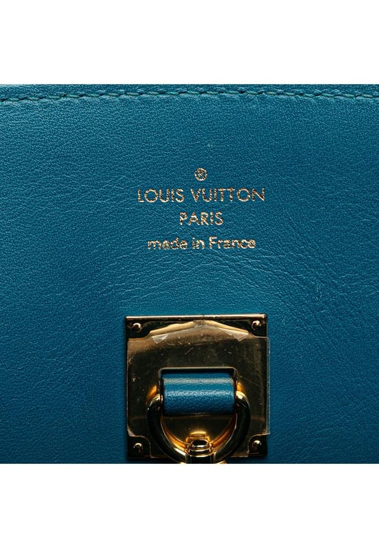The Milla MM features a leather body rolled leather handles an open top with a lobster hook and twist lock closure an interior zip compartment and interior slip pockets.Brand: Louis VuittonCondition: Pre-lovedType: SatchelRating: B+Main Material: LeatherDimensions (LxWxD): 25x38x15Handle Drop: 13Dust Bag: YesComments: Lock Scratched. Exterior Corners Worn. Exterior Front Scratched. Exterior Handle Cracked Creased Worn. Interior Pocket Scratched. Interior Pocket stained with Other. Key Scratched. Interior Lining Scratched. Interior Lining stained with Other. Practical Attachment Scratched. Exterior Side Out Of Shape Worn. Exterior Top Worn. Zipper Scratched.