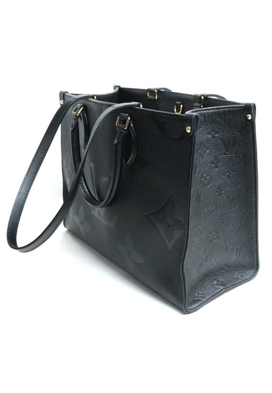 Brand: Louis Vuitton
Model: Onthego
Color: Black
Material: Leather
Inclusions: None
Dimensions: 26cm x 34cm x 15cm
Serial number: M45595
Country of origin: France
Condition: B - good condition.
Outside condition : Overall Traces of Use - Scratches
Inside condition : Good condition
Handle condition : Base of handle Peelings Slight
Corner condition : Discoloration Slight - scratches
Metal fittings condition : ScuffsBrand: Louis VuittonType: toteMain Material: Leather