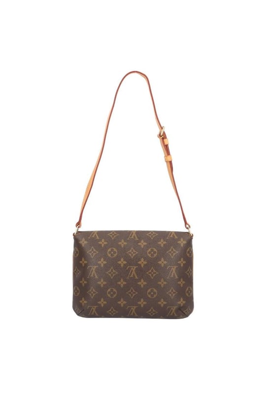 Brand: Louis Vuitton
Model: Musette Tango
Color: Brown
Material: Canvas
Inclusions: 
Dimensions: W 27 cm x H 20 cm x D 4 cm
Serial number: None
Country of origin: France
Condition: B - good condition.
Outside condition : Slight loss of shape Slight scratches
Inside condition :  Slight scratches
Handle condition : Slight loss of shape
Corner condition : Slight rubbed
Metal fittings condition : GoodBrand: Louis VuittonType: shoulderMain Material: Canvas