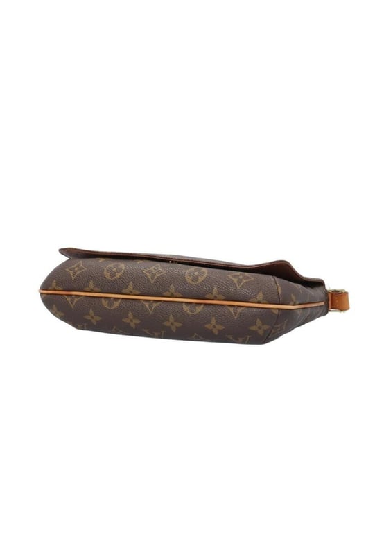 Brand: Louis Vuitton
Model: Musette Tango
Color: Brown
Material: Canvas
Inclusions: 
Dimensions: W 27 cm x H 20 cm x D 4 cm
Serial number: None
Country of origin: France
Condition: B - good condition.
Outside condition : Slight loss of shape Slight scratches
Inside condition :  Slight scratches
Handle condition : Slight loss of shape
Corner condition : Slight rubbed
Metal fittings condition : GoodBrand: Louis VuittonType: shoulderMain Material: Canvas
