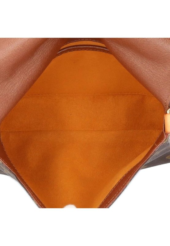 Brand: Louis Vuitton
Model: Musette Tango
Color: Brown
Material: Canvas
Inclusions: 
Dimensions: W 27 cm x H 20 cm x D 4 cm
Serial number: None
Country of origin: France
Condition: B - good condition.
Outside condition : Slight loss of shape Slight scratches
Inside condition :  Slight scratches
Handle condition : Slight loss of shape
Corner condition : Slight rubbed
Metal fittings condition : GoodBrand: Louis VuittonType: shoulderMain Material: Canvas