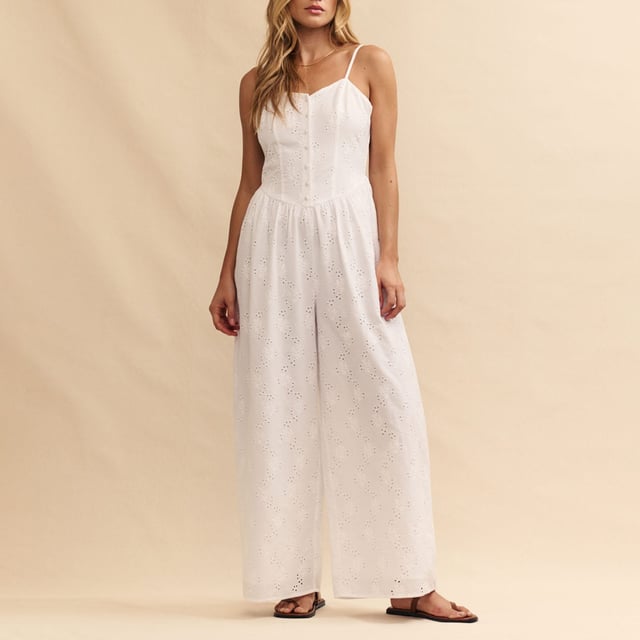 Womens Nobody's Child Tricia Broderie Anglaise Jumpsuit in white.So effortless.  Here’s another white jumpsuit to add to your collection. Featuring broderie anglaise embroidery all over  Tricia is framed by a corset-inspired dipped waist that flares out into a breezy wide leg cut. Style yours with summer sandals.- Adjustable spaghetti straps - Covered buttons- Shirred sides for comfort - Wide leg cut that skims the body - Lightly lined so the fabric falls beautifully- Size tip: we recommend your usual size- 85% Birla Lyocell™  15% Linen.  Machine washable.- Ref: P240880WHT