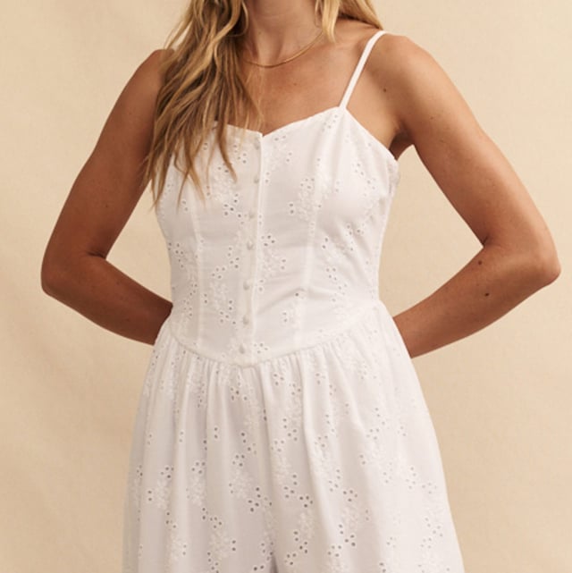 Womens Nobody's Child Tricia Broderie Anglaise Jumpsuit in white.So effortless.  Here’s another white jumpsuit to add to your collection. Featuring broderie anglaise embroidery all over  Tricia is framed by a corset-inspired dipped waist that flares out into a breezy wide leg cut. Style yours with summer sandals.- Adjustable spaghetti straps - Covered buttons- Shirred sides for comfort - Wide leg cut that skims the body - Lightly lined so the fabric falls beautifully- Size tip: we recommend your usual size- 85% Birla Lyocell™  15% Linen.  Machine washable.- Ref: P240880WHT