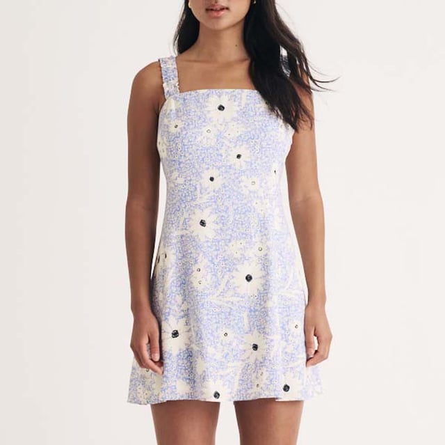 Womens Nobody's Child Kitty Floral Mini Dress in blue.More dresses  less waste. This piece was created using deadstock materials  that means we took leftover fabrics and transformed them into one of our signature styles. Made entirely from responsible viscose  this blue floral one has a so-now square neckline and bra-friendly straps detailed with wavy ruching. We’re in love with the corset-inspired ties at the back. Style yours with Mary-Jane shoes. • Thick straps• Square neck• Concealed zip fastening100% LENZING™ ECOVERO™ Viscose.  Machine washable.Ref: D242763BLU