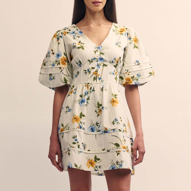 Womens Nobody's Child Floral Clover Mini Dress in white multiClover is back  but this time we’ve made her mini. Featuring a puff sleeve frame with delicate pleat detailing. Sprawling with wildflowers  she’s just what you need for that garden party. Wear with your favourite barely-there heels.- V-neck- Short puff sleeves- Panelled waist designed to flatter- Concealed zip fastening- Lightly lined so the fabric falls beautifully- Main fabric: 95% Organic Cotton  5% Linen.  Lning:100% Organic Cotton.  Machine washable.- Ref: D241447MLT