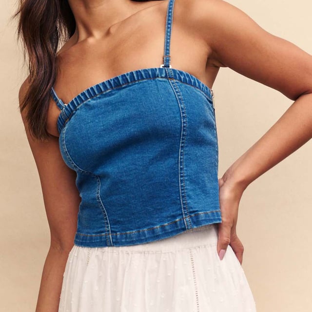 Spring is here. This structured bandeau is perfect for sun-filled celebrations in blue denim. Made from organic cotton blended with a touch of stretch  it's sure to frame your figure in all the right places.  Elevate yours with gold jewellery. - Concealed zip fastening - Designed for a close cut.- Ref: D240726BLU