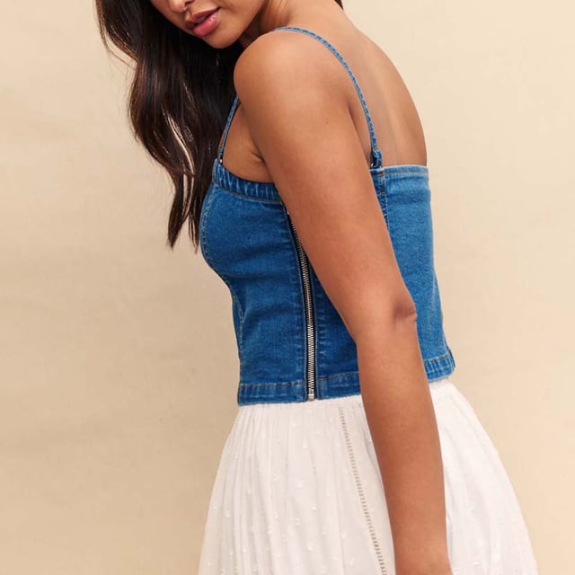 Spring is here. This structured bandeau is perfect for sun-filled celebrations in blue denim. Made from organic cotton blended with a touch of stretch  it's sure to frame your figure in all the right places.  Elevate yours with gold jewellery. - Concealed zip fastening - Designed for a close cut.- Ref: D240726BLU