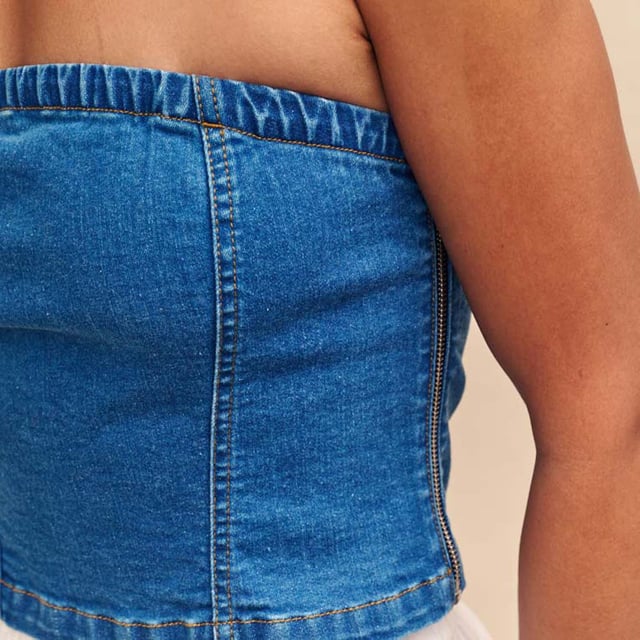 Spring is here. This structured bandeau is perfect for sun-filled celebrations in blue denim. Made from organic cotton blended with a touch of stretch  it's sure to frame your figure in all the right places.  Elevate yours with gold jewellery. - Concealed zip fastening - Designed for a close cut.- Ref: D240726BLU