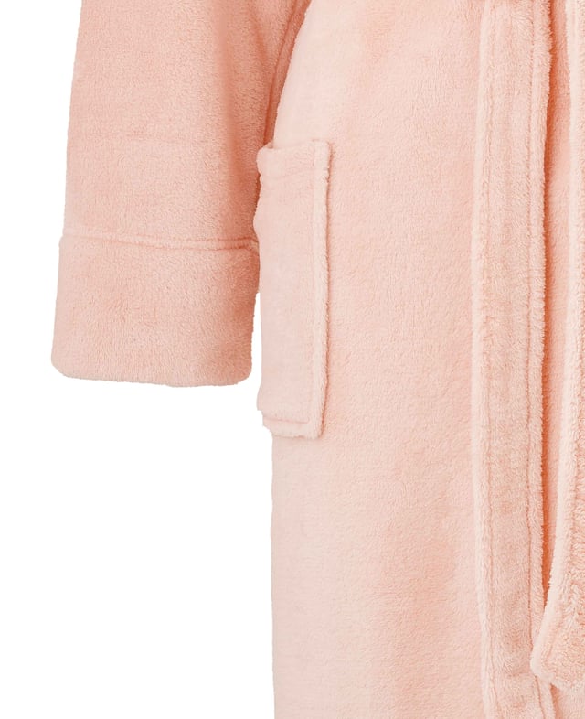 A beautifully soft fleece dressing gown in dusky pink. Lightweight yet warm enough for cold winter nights. Featuring a shawl collar, patch pockets and belted waist. 100% super soft polyester. Lightweight. 2 patch pockets. Length 120cm approx.. Back neck hanging loop. Machine washable at 40°C.