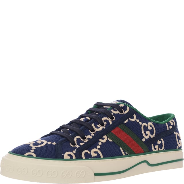 Gucci Women's Tennis 1977 Logo-Embroidered Canvas Sneakers â€“ Blue
Retro-inspired canvas sneakers featuring embroidered logos and signature webbing.