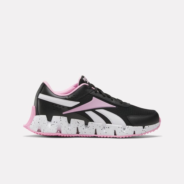 The iconic Reebok Zig midsole can’t be missed  with a chunky look that cranks your style up to a 10. Heel-to-toe energy-responsive cushioning ensures every step you take is smooth  whether you’re out for a run or just kicking a ball around.SpecificationsoLace closureoMesh upperoRubber outsole.