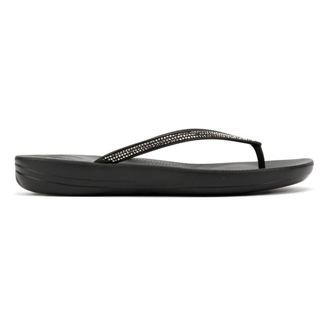 FitFlop Iqushion Sparkle Rubber Women's Black Flip Flops Waterproof ergonomic flip-flops with a durable rubber upper and anatomically shaped straps for a secure fit adorn with micro-crystals . Designed with a contoured footbed to support natural alignment and reduce toe gripping. Lightweight, flexible, and perfect for beach days, poolside lounging, or everyday summer wear.