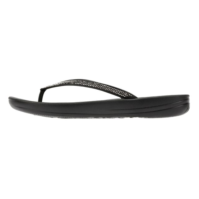 FitFlop Iqushion Sparkle Rubber Women's Black Flip Flops Waterproof ergonomic flip-flops with a durable rubber upper and anatomically shaped straps for a secure fit adorn with micro-crystals . Designed with a contoured footbed to support natural alignment and reduce toe gripping. Lightweight, flexible, and perfect for beach days, poolside lounging, or everyday summer wear.