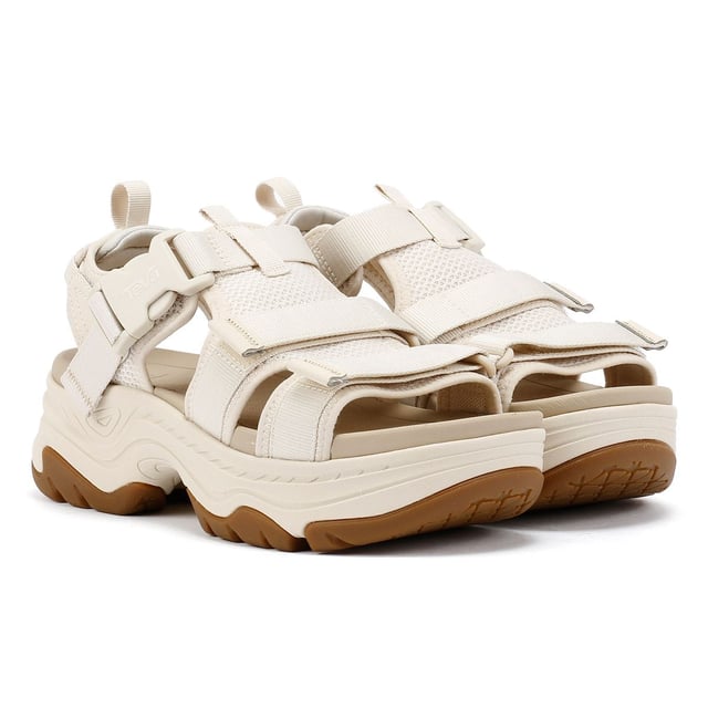Elevated platform sandals featuring an archival-inspired upper with quick-dry, padded straps for all-day comfort. Crafted with a lightweight EVA footbed and a durable rubberized outsole for reliable traction. Made using 100% REPREVE® recycled polyester webbing a sustainable, eco-friendly choice.