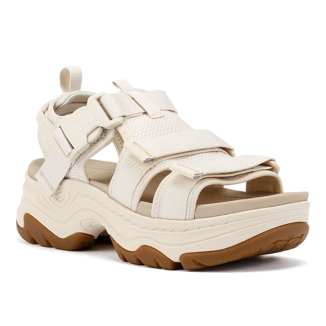 Elevated platform sandals featuring an archival-inspired upper with quick-dry, padded straps for all-day comfort. Crafted with a lightweight EVA footbed and a durable rubberized outsole for reliable traction. Made using 100% REPREVE® recycled polyester webbing a sustainable, eco-friendly choice.