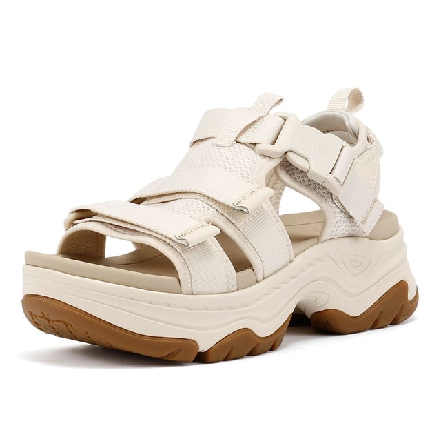 Elevated platform sandals featuring an archival-inspired upper with quick-dry, padded straps for all-day comfort. Crafted with a lightweight EVA footbed and a durable rubberized outsole for reliable traction. Made using 100% REPREVE® recycled polyester webbing a sustainable, eco-friendly choice.