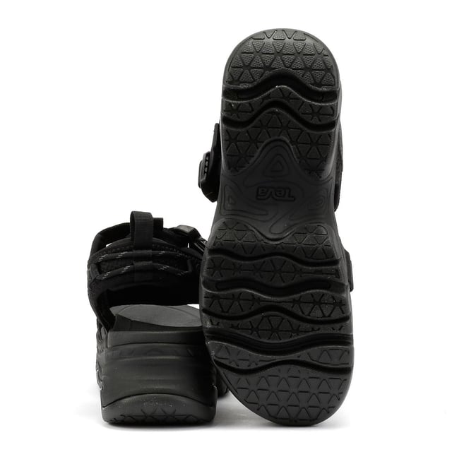 Elevated platform sandals featuring an archival-inspired upper with quick-dry, padded straps for all-day comfort. Crafted with a lightweight EVA footbed and a durable rubberized outsole for reliable traction. Made using 100% REPREVE® recycled polyester webbing a sustainable, eco-friendly choice.