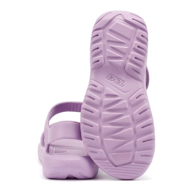 Ultra-lightweight EVA sandals crafted with a full injection-molded design for maximum comfort and durability. Features an easy hook-and-loop closure for a secure, adjustable fit. Water-friendly, vegan, and made with recycled sustainable materials.