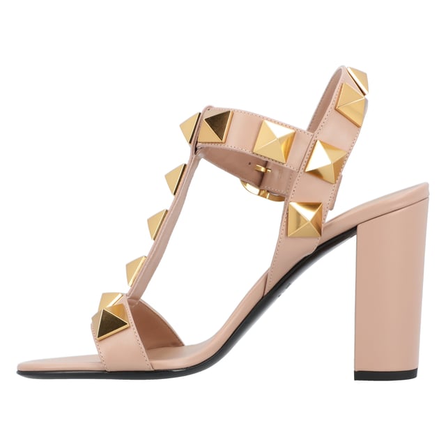 Highlights
 Pink
 Calf leather
 iconic Roman Stud rivets
 Logo embossed in the footbed
 toeless
 Buckle closure on the side
 Block heel 90mm
 

 composition
 Outer material: metal 100%, calf leather 100%
 

 Lining: Lamb leather 100%
 

 Sole: Calf leather 100% Measurments:  height: 90 mm
