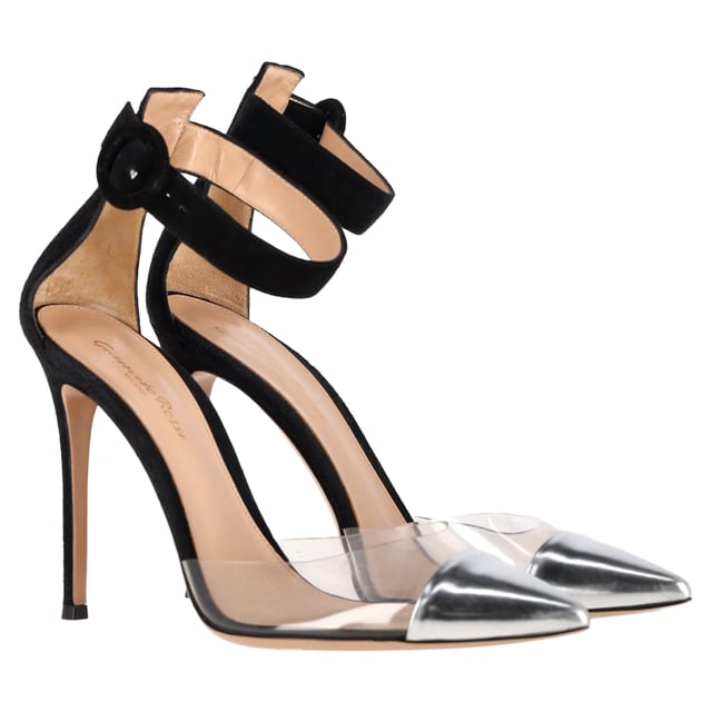 VINTAGE, RRP AS NEW

These Gianvito Rossi sandals are artfully crafted in a combination of leather, suede and PVC that lend it a contemporary chic look. Featuring a pointed toe, this pair comes with an ankle strap and 10.5 cm heel. Look your fashionable best by styling them with a classy dress and statement accessory.

Gianvito Rossi PVC Ankle Strap Pumps in Black Suede
Condition: Excellent
Signs of wear: No visible sign of wear. No Mark at insole.,  Very light mark at soles.
Packaging: Dust bag
Color: black
Material: Suede | suede
Size: EU | 39
Measurements: Heel height: 110; Insole length: 260
SKU: NAPPUGBSH480444W