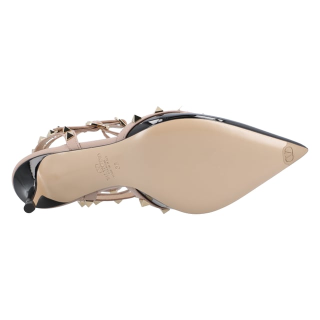 Upper: 100% leather
 Color: Black and Pink
 Rubber sole
 Heel height: 65 mm
 Other details: rivets on the strap
 Made in Italy